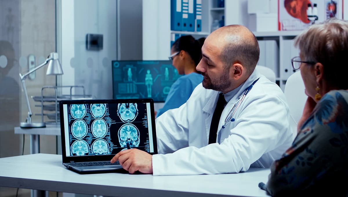 Doctors reviewing brain scans